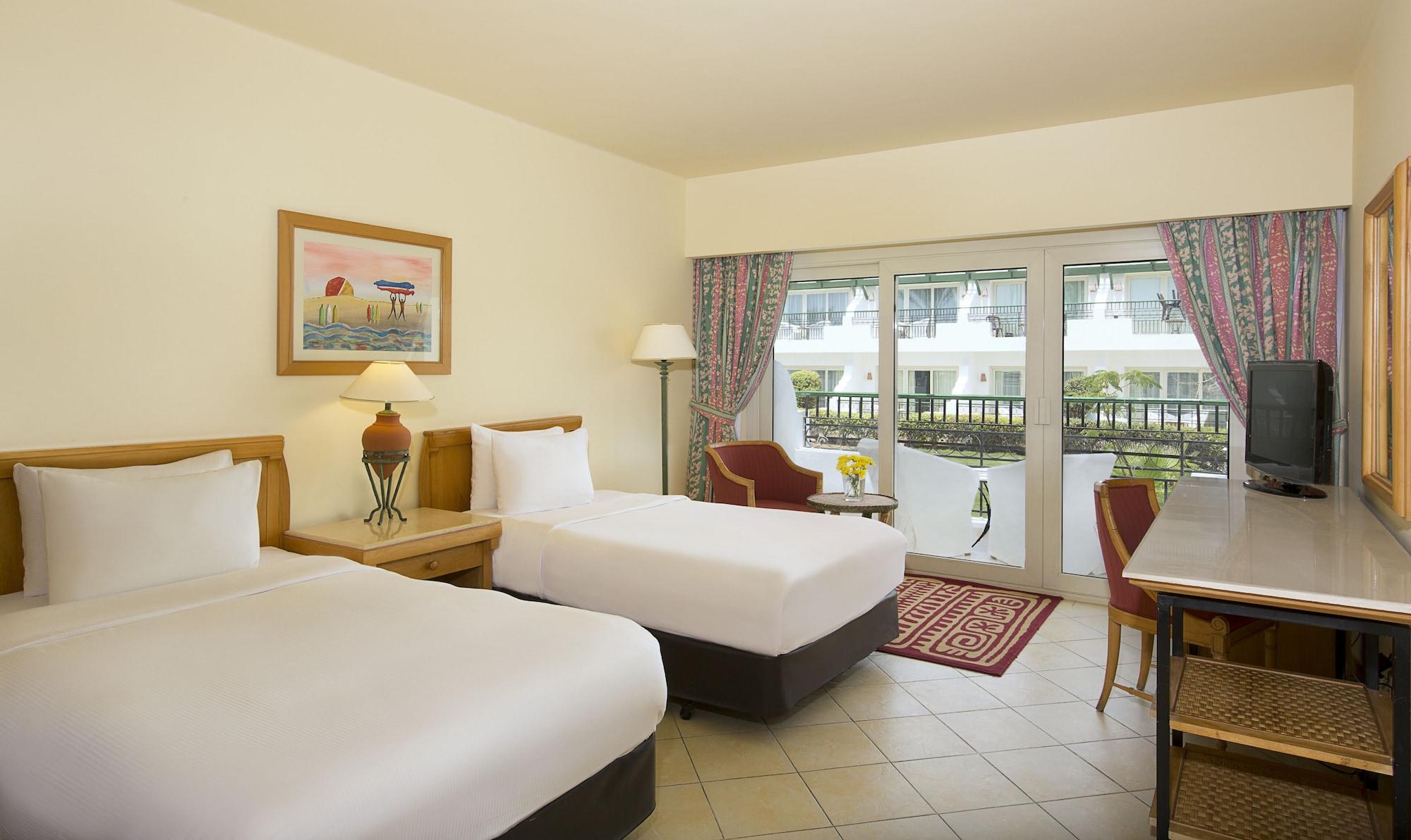 Safir Sharm Waterfalls Resort Exterior foto A room at the Hilton Sharm El Sheikh