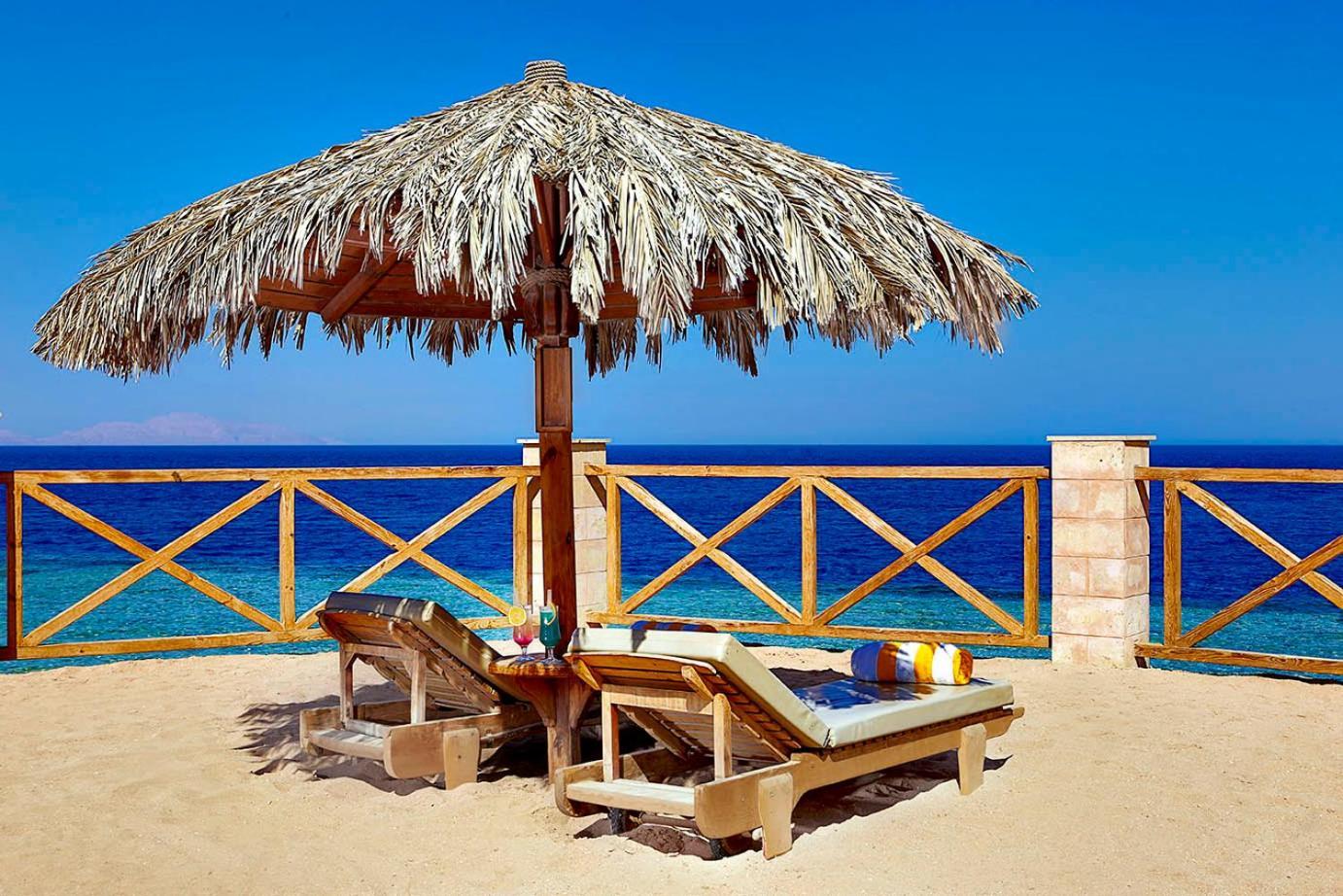 Safir Sharm Waterfalls Resort Exterior foto A beach umbrella