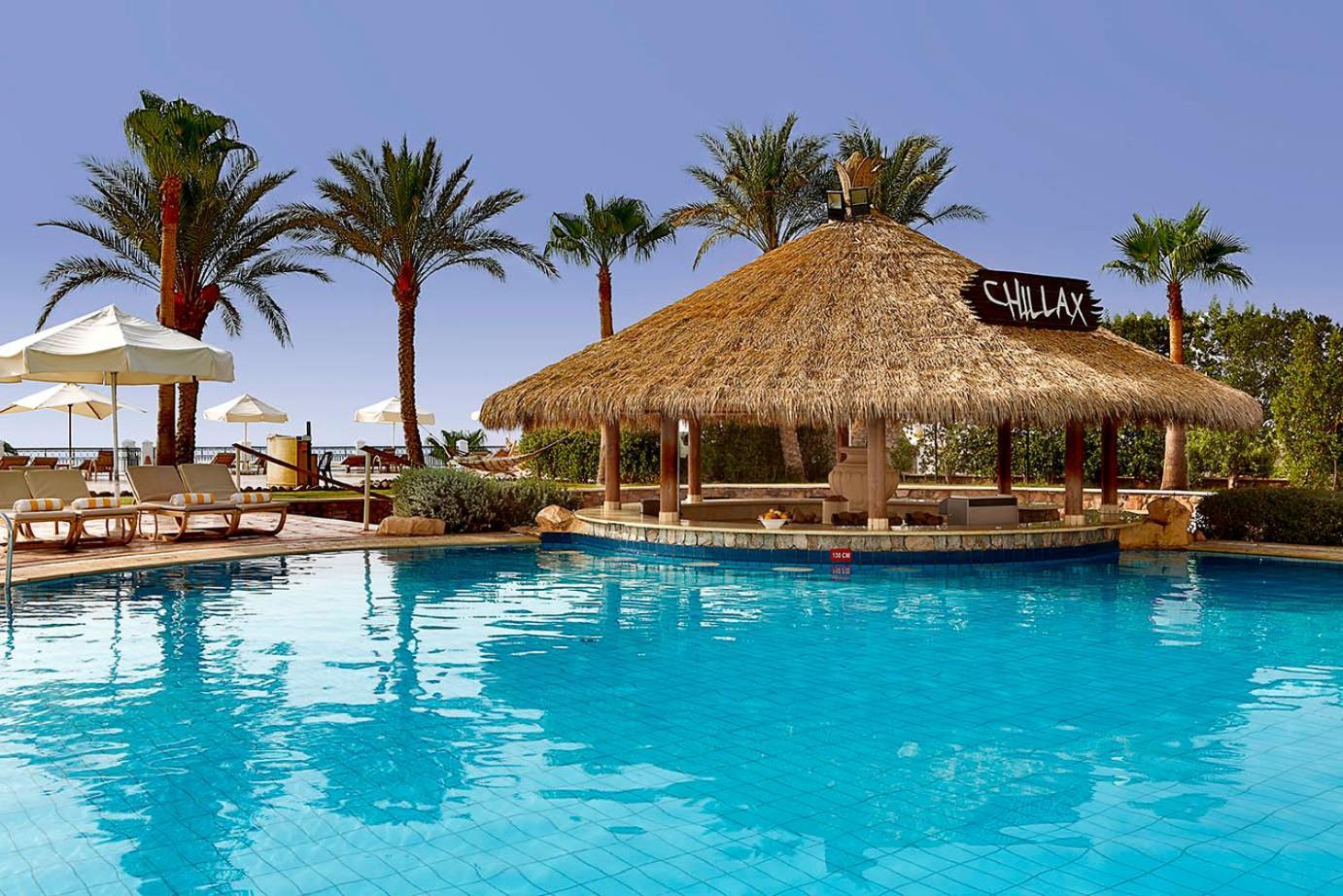 Safir Sharm Waterfalls Resort Exterior foto The pool at the Hilton Sharm El Sheikh